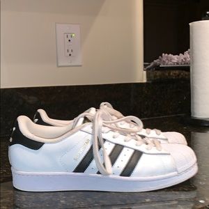 gently used woman’s Adidas superstars